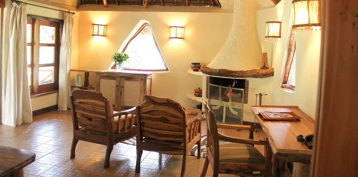 Chui Lodge sitting room with fireplace