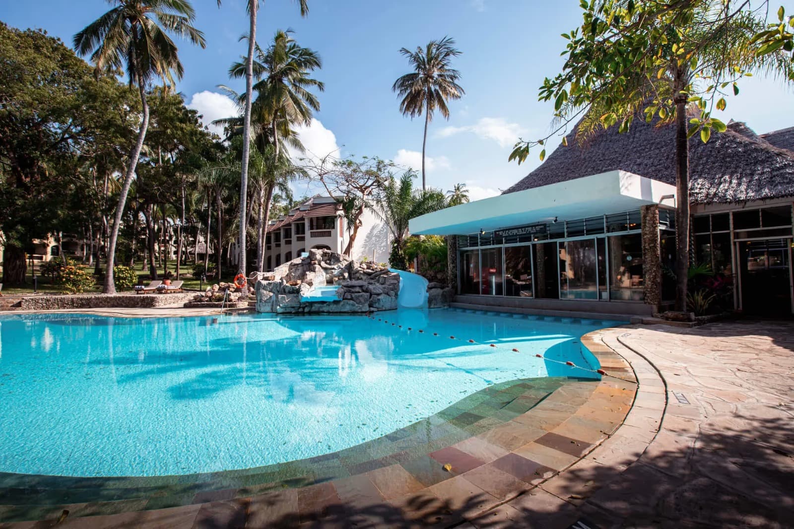 Severin Sea Lodge pool and palm garden in Mombasa